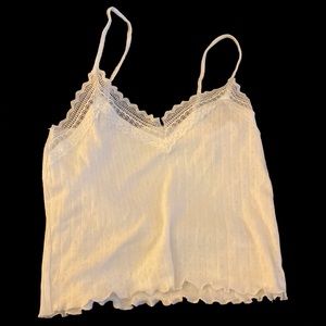 I’m selling a white American Eagle top it’s a size small but it’s also good Med